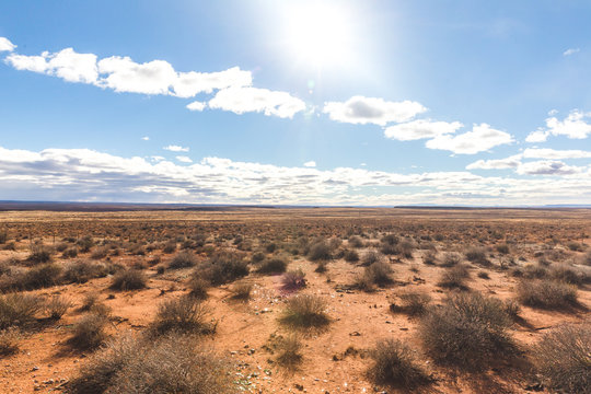 Remote desert landscape under bright sun