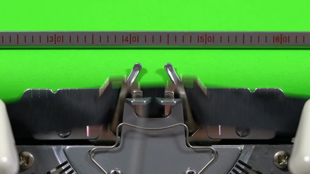 Typewriter with green screen.