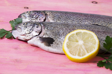 Trout on wooden background
