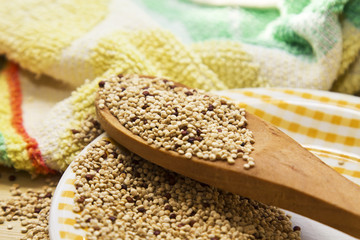 Dish with quinoa on wood