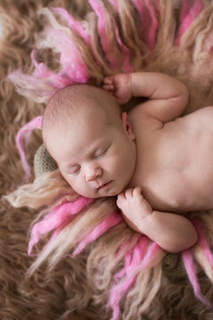sweet sleeping newborn baby on gentle background