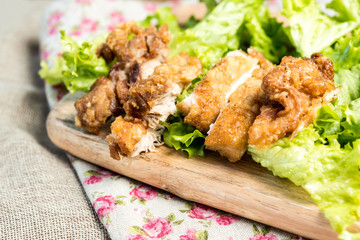 delicious fried chicken wings with vegetable