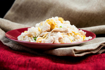 Homemade Chinese fried rice with vegetables and fried eggs