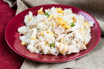 Homemade Chinese fried rice with vegetables and fried eggs