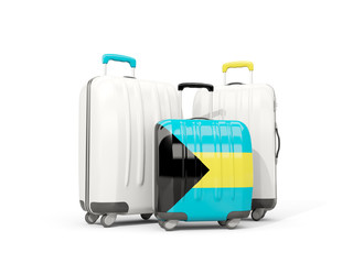 Luggage with flag of bahamas. Three bags isolated on white