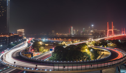 Fototapeta na wymiar urban traffic with cityscape in Nanchang,China.