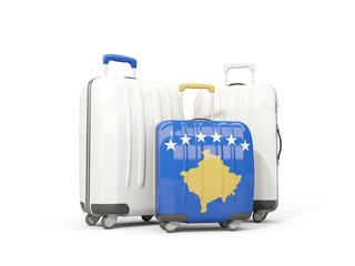 Luggage with flag of kosovo. Three bags isolated on white
