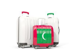 Luggage with flag of maldives. Three bags isolated on white