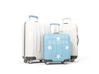 Luggage with flag of micronesia. Three bags isolated on white