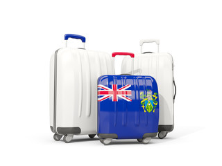 Luggage with flag of pitcairn islands. Three bags isolated on white