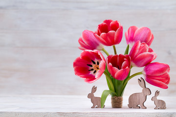 Pink tulips, spring flowers and Easter decoration.