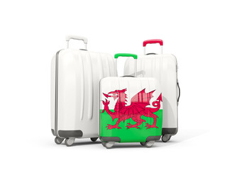 Luggage with flag of wales. Three bags isolated on white
