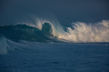 Huge barrels Ocean waves in morning light