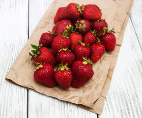 ripe strawberries on wooden table