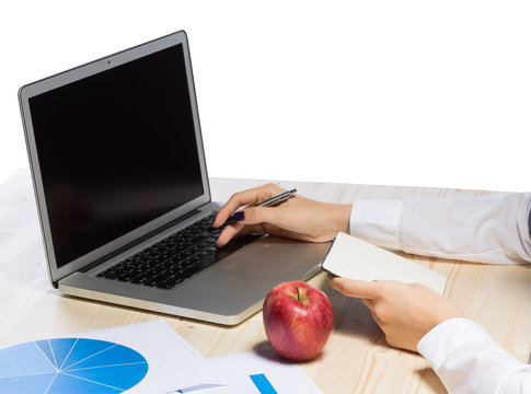 Business woman in an office holding red apple - Clipping Path