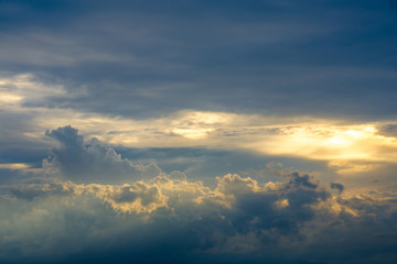 Sun rays bursting through the clouds.