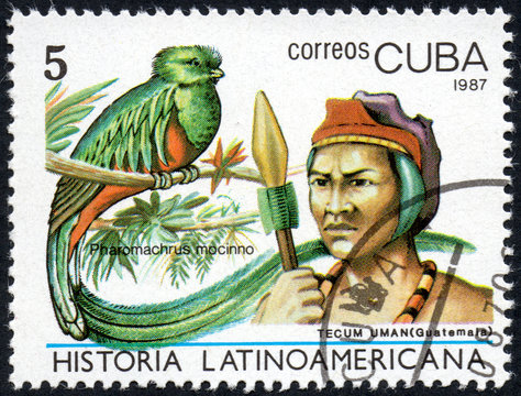 UKRAINE - CIRCA 2017: A stamp printed in Cuba, shows Image of a chieftain Tecum Uman Guatemala and bird Pharomachrus mocinno, the series Latin American history, circa 1987