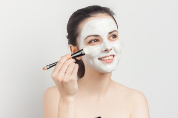 Fototapeta premium happy woman with a mask on her face