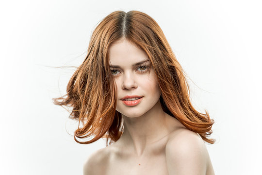 loose red hair, beautiful face of a woman