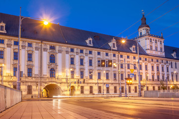 Fototapeta na wymiar Evening view of University of Wroclaw, Odra River and the University Bridge