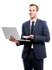 Businessman using laptop, isolated