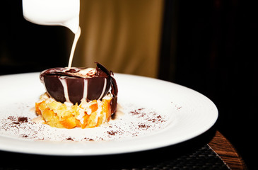 feeding chocolate dessert in a restaurant