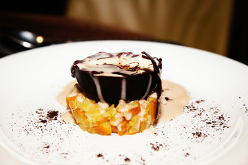 feeding chocolate dessert in a restaurant