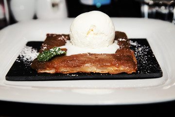 apple pie with a scoop of ice cream