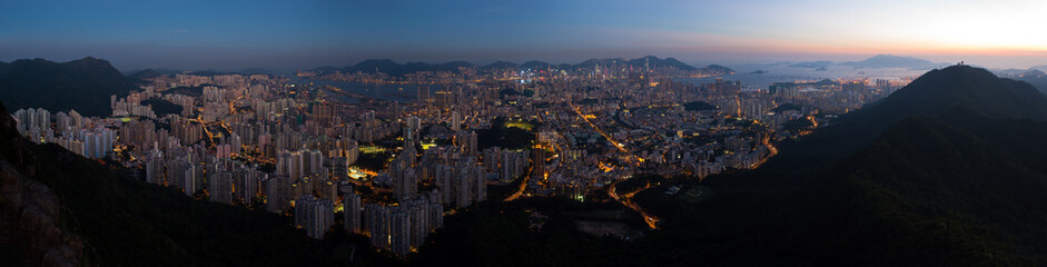 Top view from The lion rock park, sunset onver Kowloon and Hong kong sky.