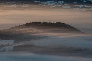 Misty mountains landscape in the morning, Poland