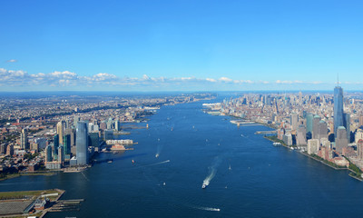 New York, USA, September 28, 2013: New York Harbor with Empire State Building and Hudson River, Aerial view - obrazy, fototapety, plakaty
