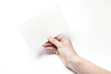 woman hand hold a empty post card isolated white.