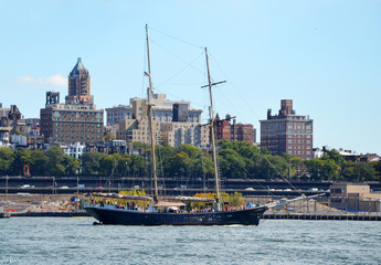 Fototapeta premium Brooklyn skyline and sailing ship on east river as seen from Wall Street, Manhattan, New York