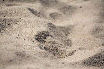 Sandkörner, eine unebene Anordnung