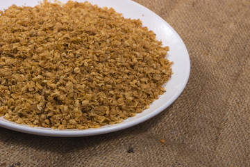 the composition of the flakes of buckwheat on a plate