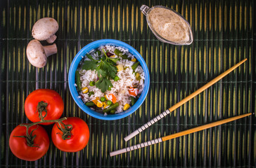 Rice on wooden background
