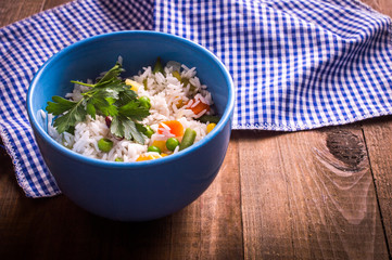 Rice on wooden background