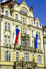 Fototapeta na wymiar Prague, city center, row of houses, Czech flag, EU flag, Czech R
