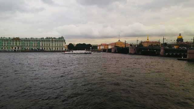 Touristic boat in St Petersburg, Russia. Nightlife in Saint Petersburg with illuminated historical buildings and Neva river