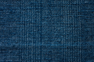 Closeup dark blue yarn textile background and textured