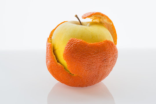 Apple in a tangerine peel