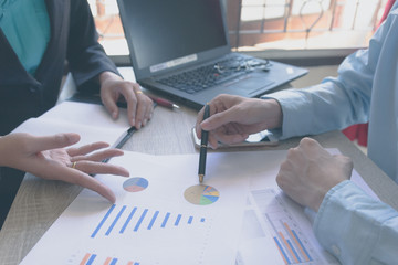 Businessman hold the pen and meeting team present the project .professional investor working with new project. Concept business and financial