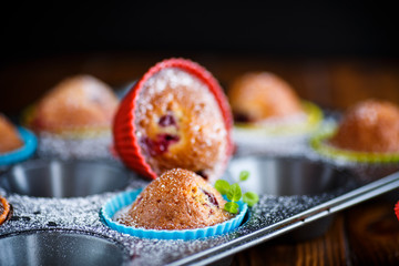 sweet muffins with berries inside