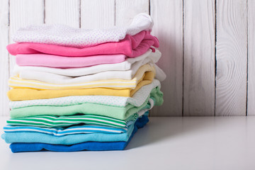 Folded baby clothes