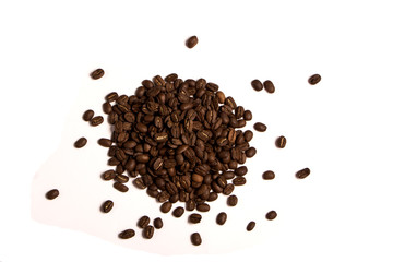 Roasted coffee beans on white background