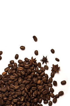 Roasted coffee beans on white background © Iuliia