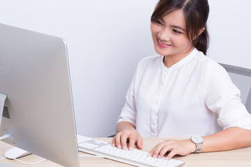 Asian woman show her smile at office