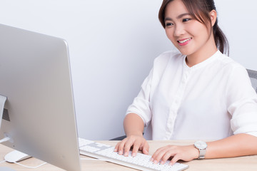 Asian woman show her smile at office