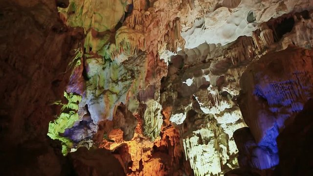 Colorful cave in Ha Long bay Vietnam.