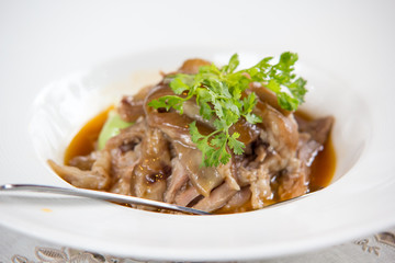 Chinese food a steamed pork on rice dish